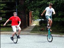 2 unicyclists